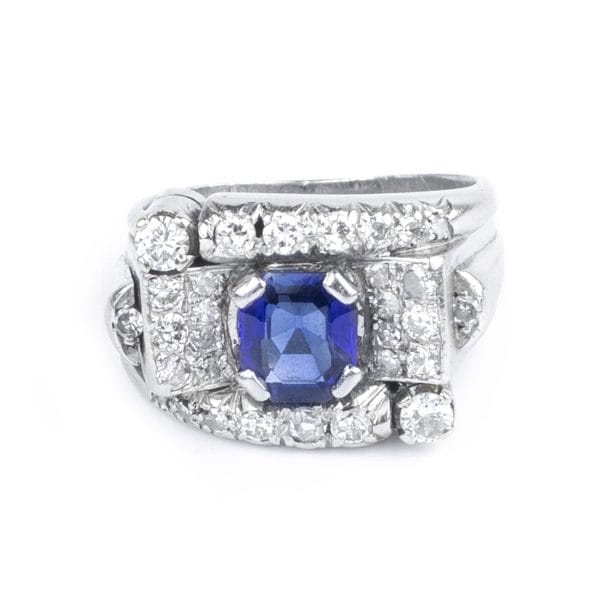 Anello dec&ograve; con zaffiro centrale e diamanti-1